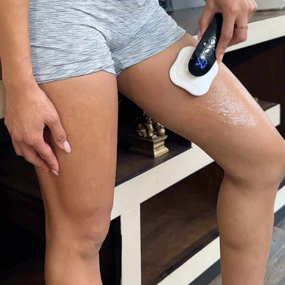Model using AdoreKart Ultrasonic Fat Removal Machine on thigh for fat burning and body shaping.