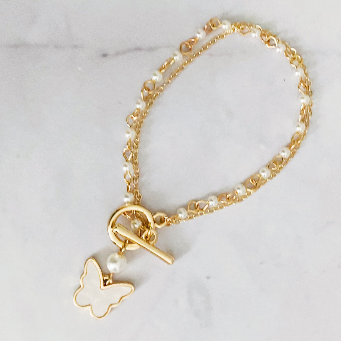 Layered Pearl Chain Butterfly Bracelet Fuchsia Hercules