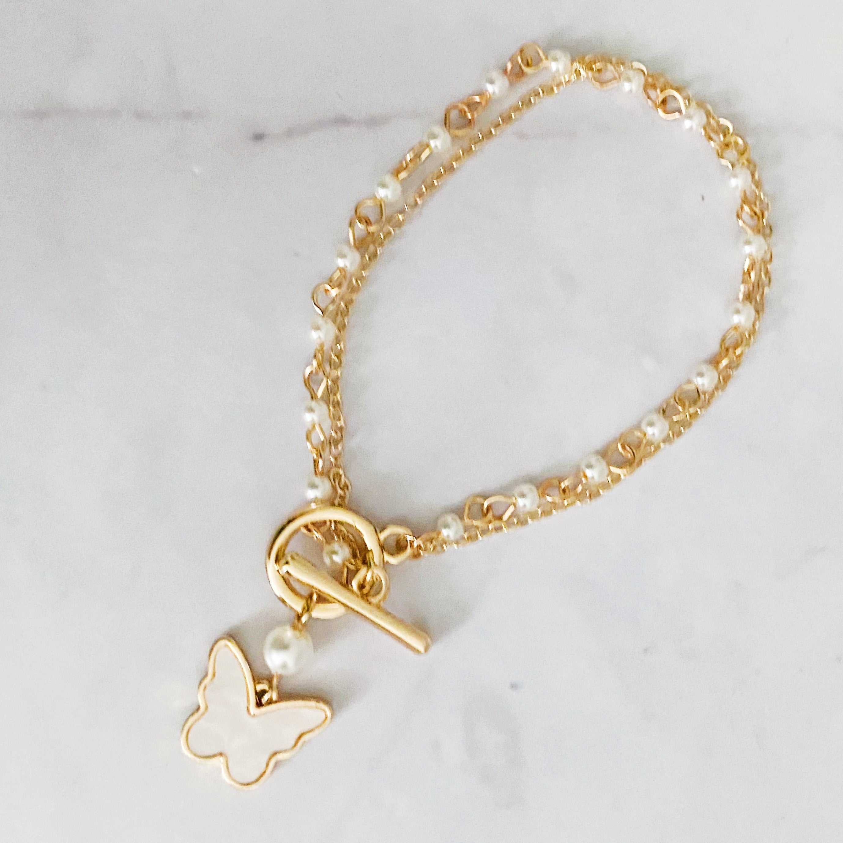 Layered Pearl Chain Butterfly Bracelet Fuchsia Hercules