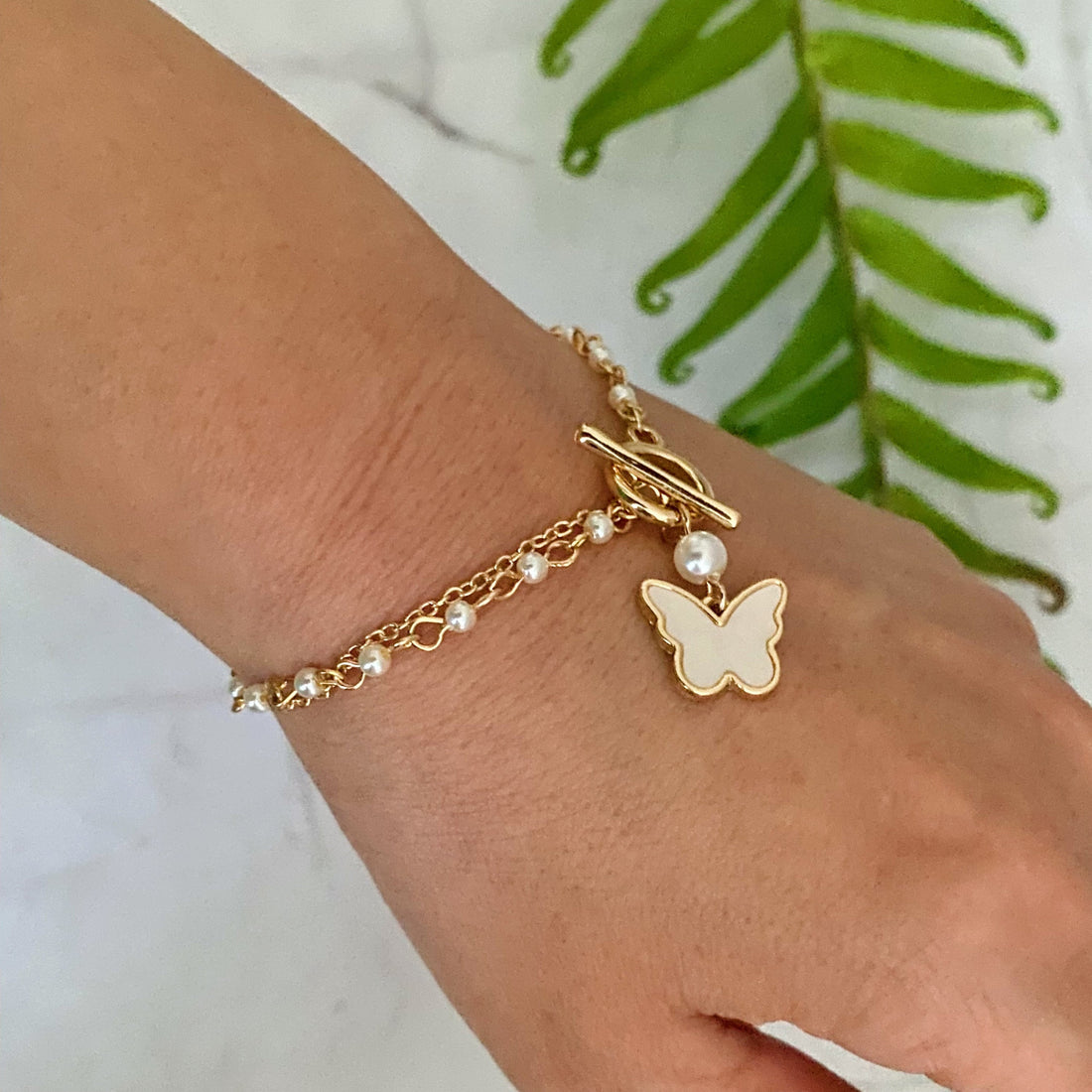 Layered Pearl Chain Butterfly Bracelet Fuchsia Hercules